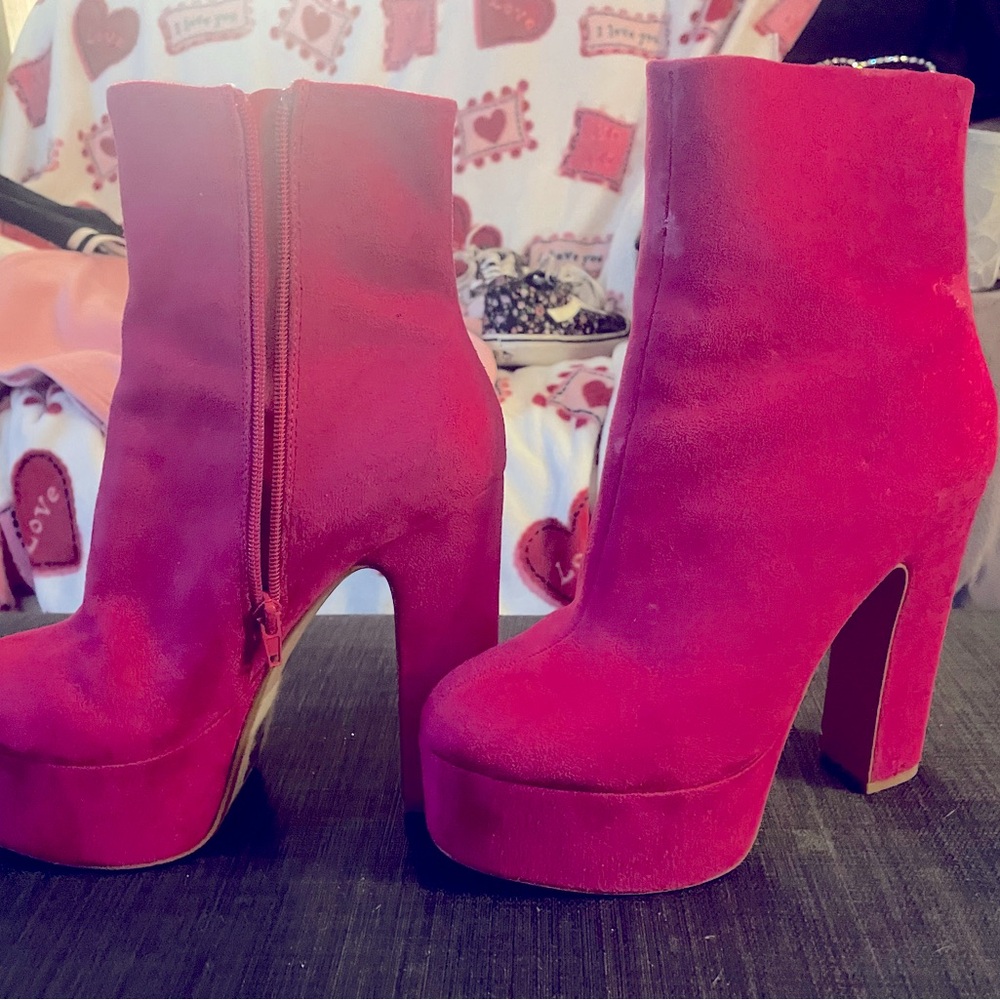 Pink high heeled booties
